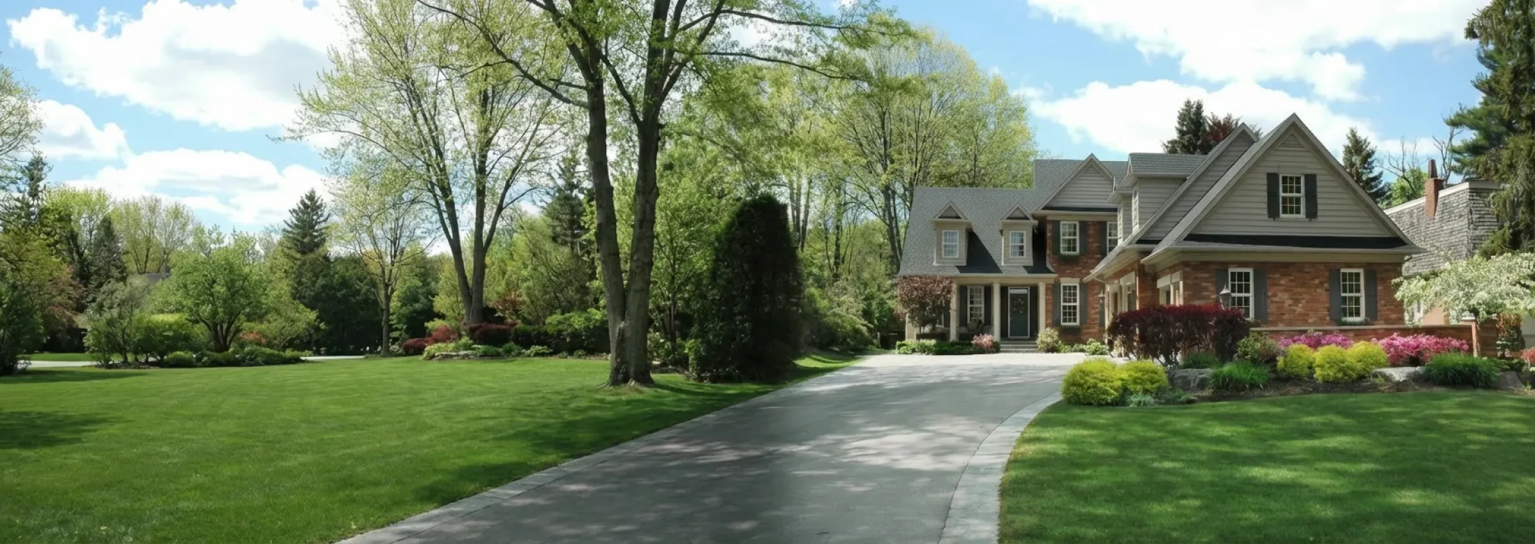 house and healthy green lawn